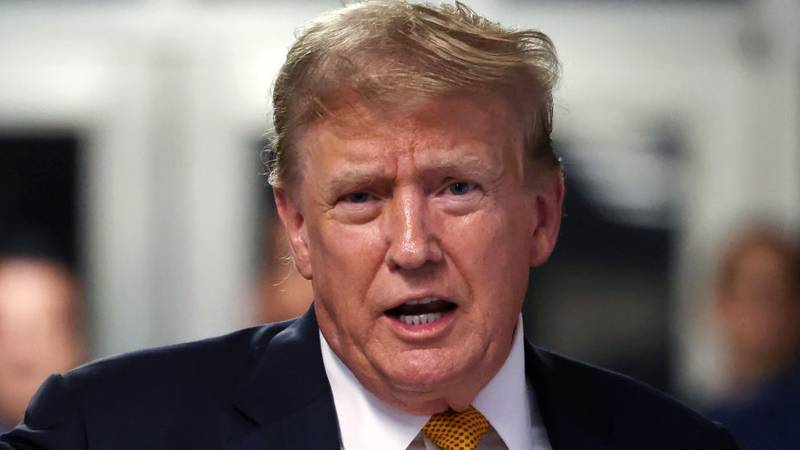 NEW YORK, NEW YORK - MAY 21: Former U.S. President Donald Trump speaks at the end of the day during his hush money trial at Manhattan Criminal Court on May 21, 2024 in New York City. The defense has rested their case in former President Trump's hush money trial in which he declined to testify in. Judge Juan Merchan says to expect summations and closing arguments in the criminal trial next week. Former U.S. President Trump faces 34 felony counts of falsifying business records in the first of his criminal cases to go to trial.  (Photo by Michael M. Santiago/Getty Images)