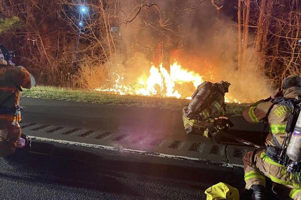 Off-duty firefighter saves woman from burning car after crash in Connecticut