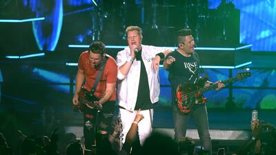 NASHVILLE, TENNESSEE - JULY 06: Joe Don Rooney, Gary LeVox and Jay DeMarcus of the band Rascal Flatts perform at Ascend Amphitheater on July 06, 2019 in Nashville, Tennessee. (Photo by Jason Kempin/Getty Images)